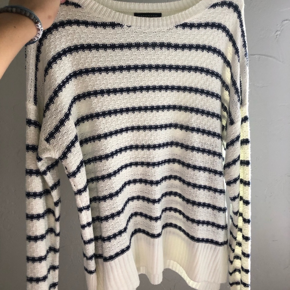 White and navy blue sweater